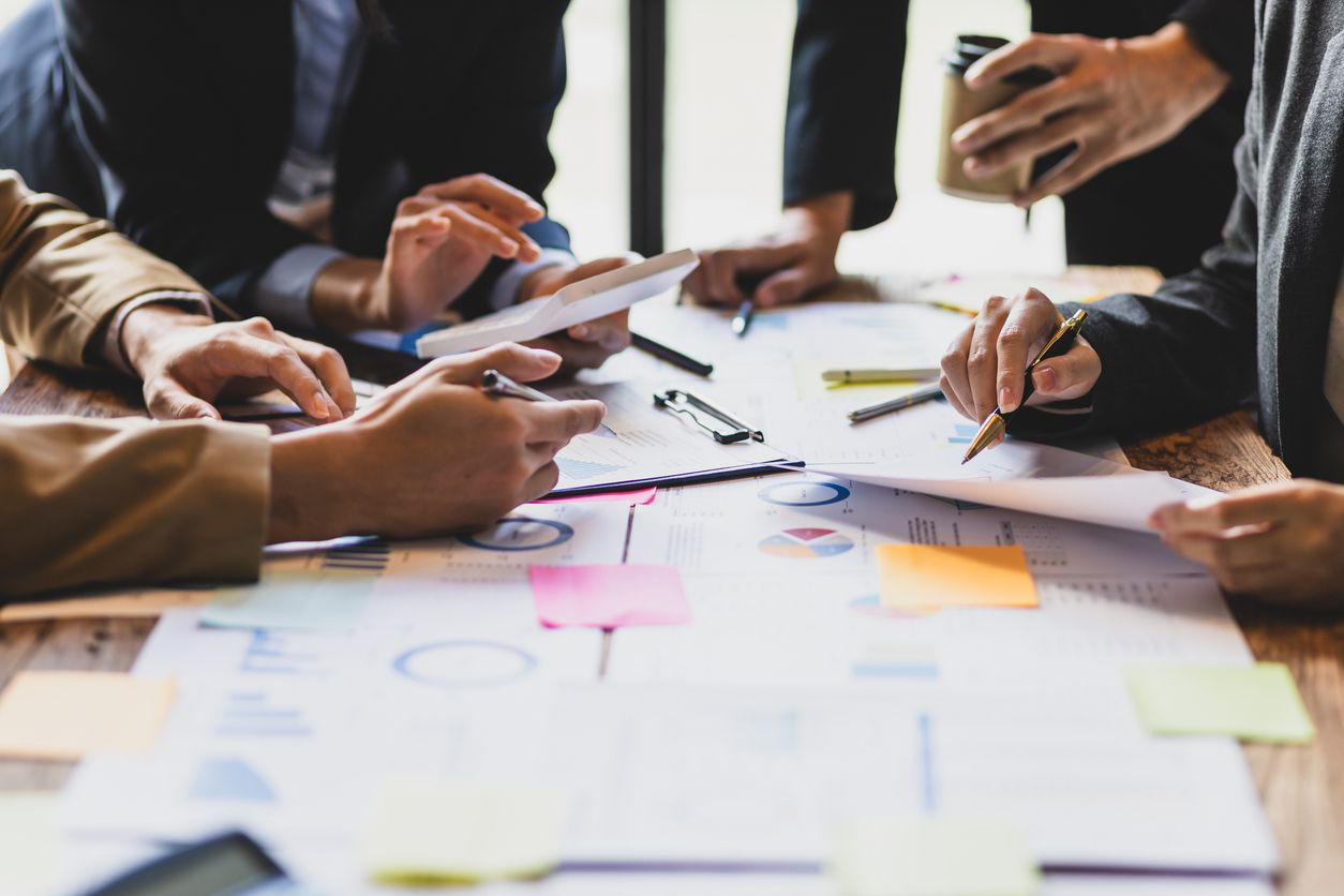 Team working with documents on a table